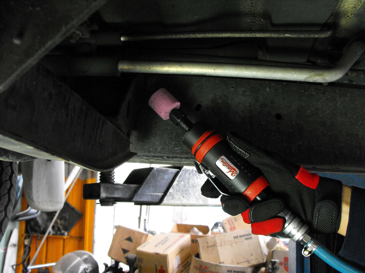 a close up of a wrench on the back of a vehicle