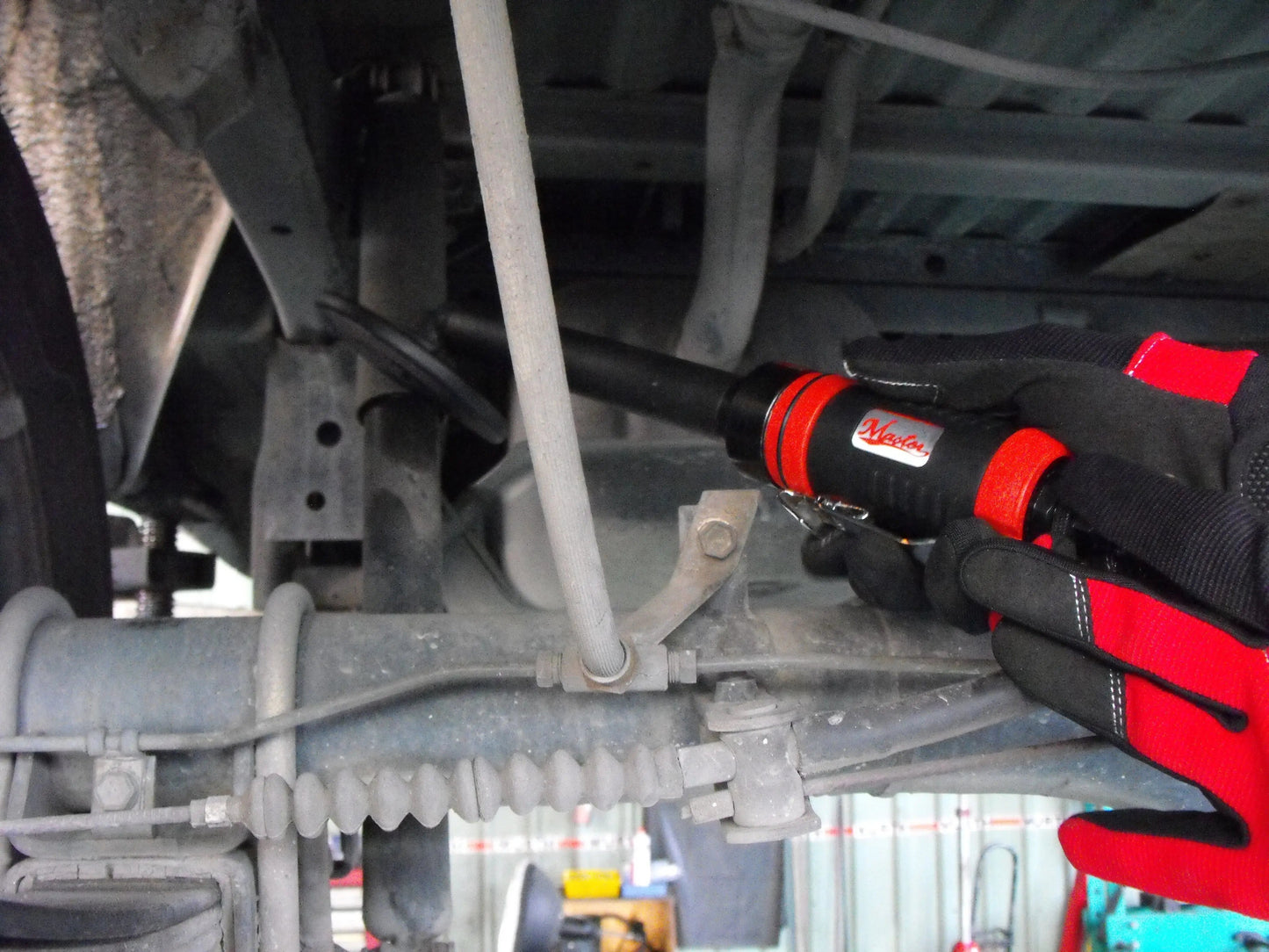 a close up of a wrench on a car